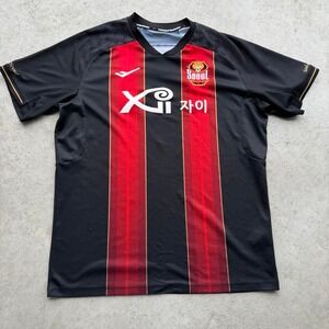 Seoul FC 2023/24 home jersey with black and red vertical stripes